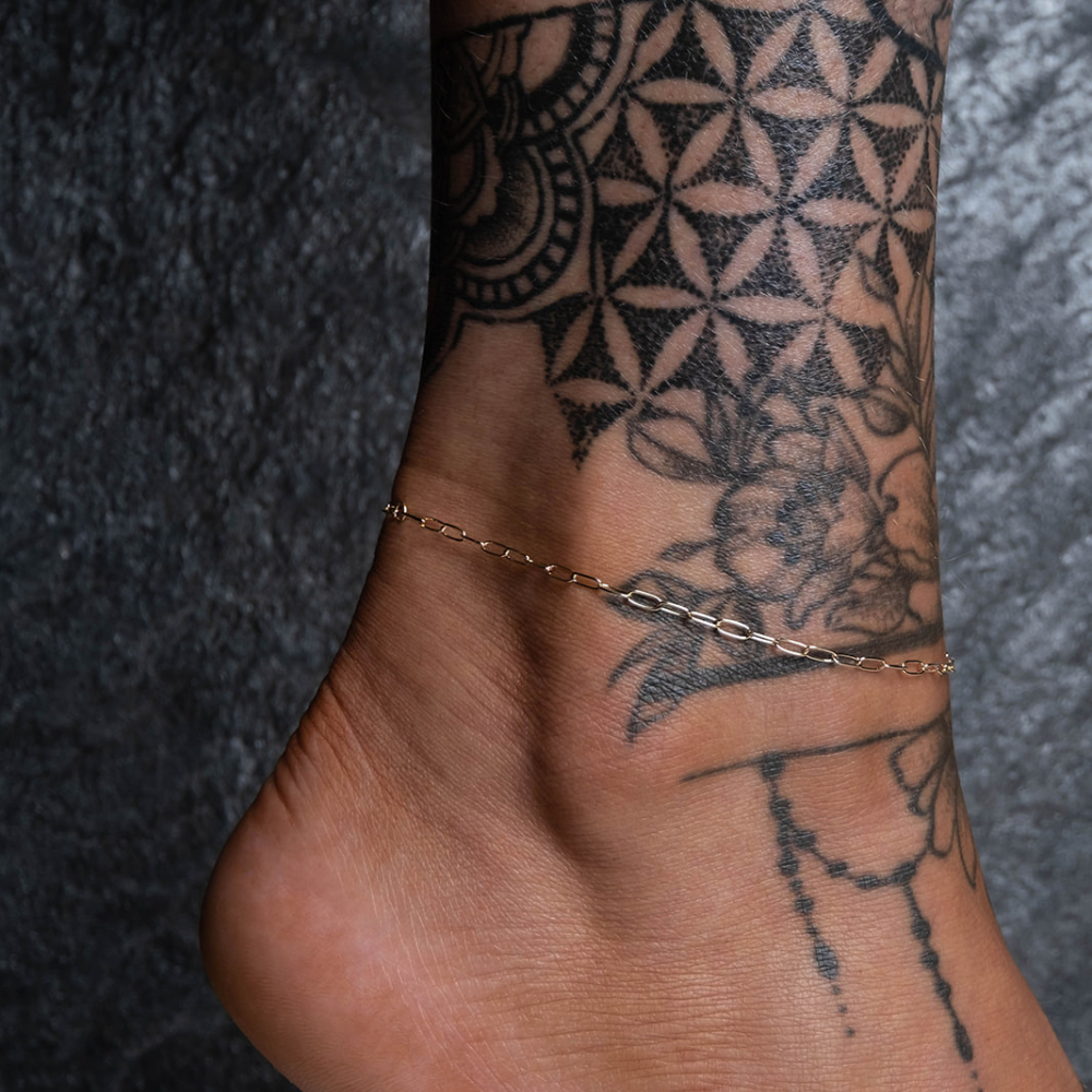 Floral ankle bracelet tattoo - Tattoogrid.net
